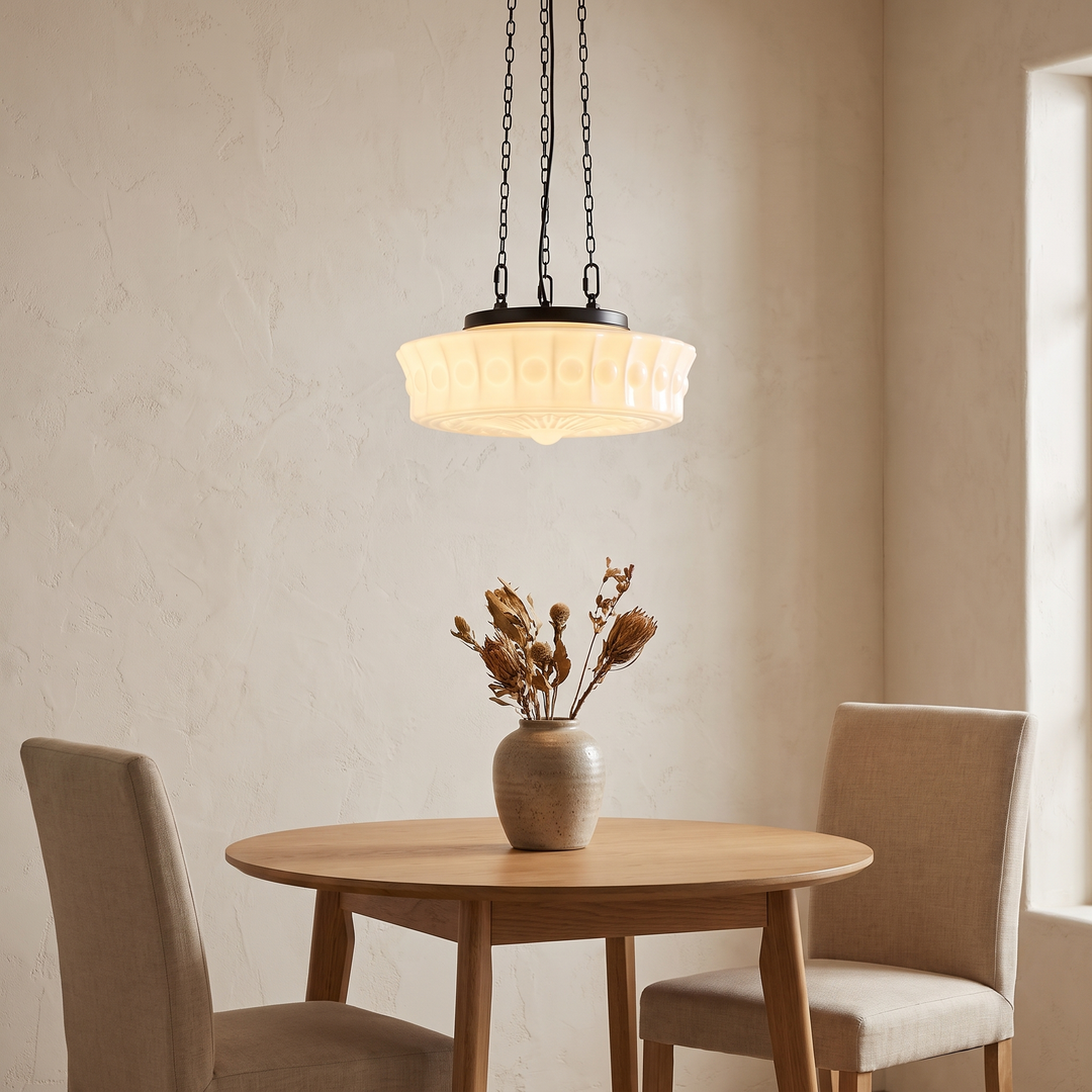 Belara opal dome pendant above a small round dining table